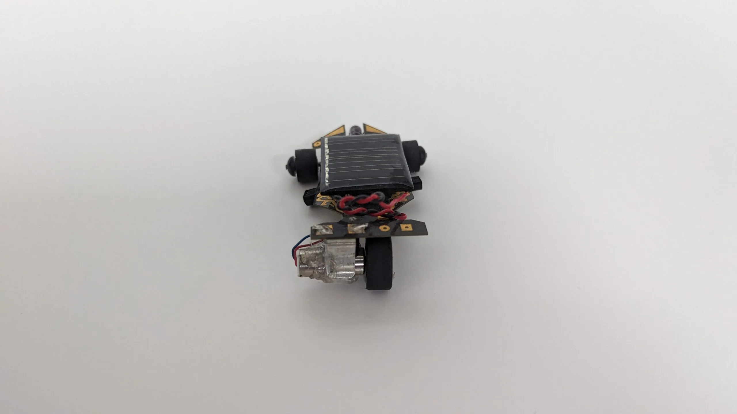 Back view of the Solar Roller, drive motor and rubber wheel tucked at the back.