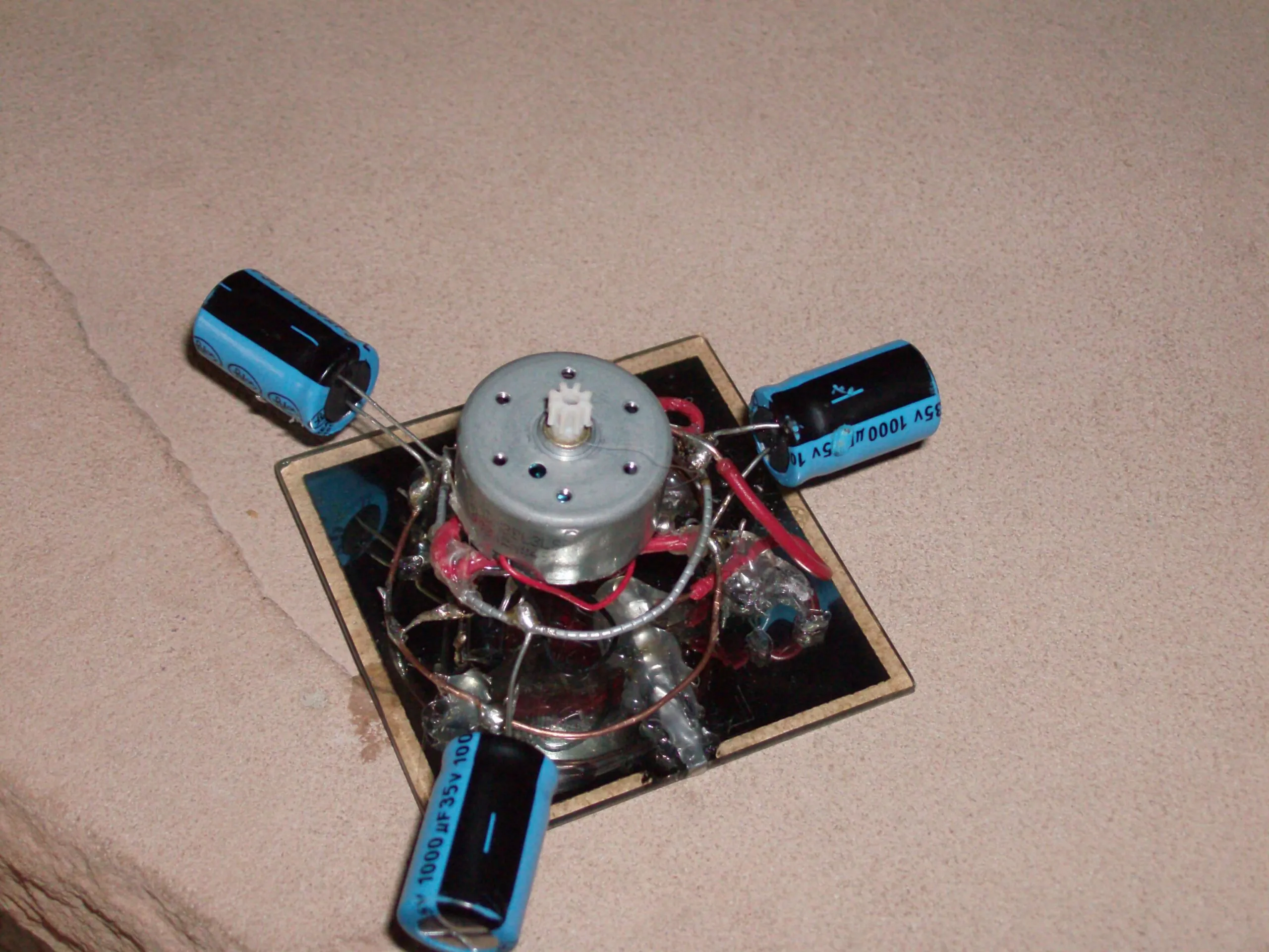 The Symet flipped upside-down, motor shaft pointing skyward.