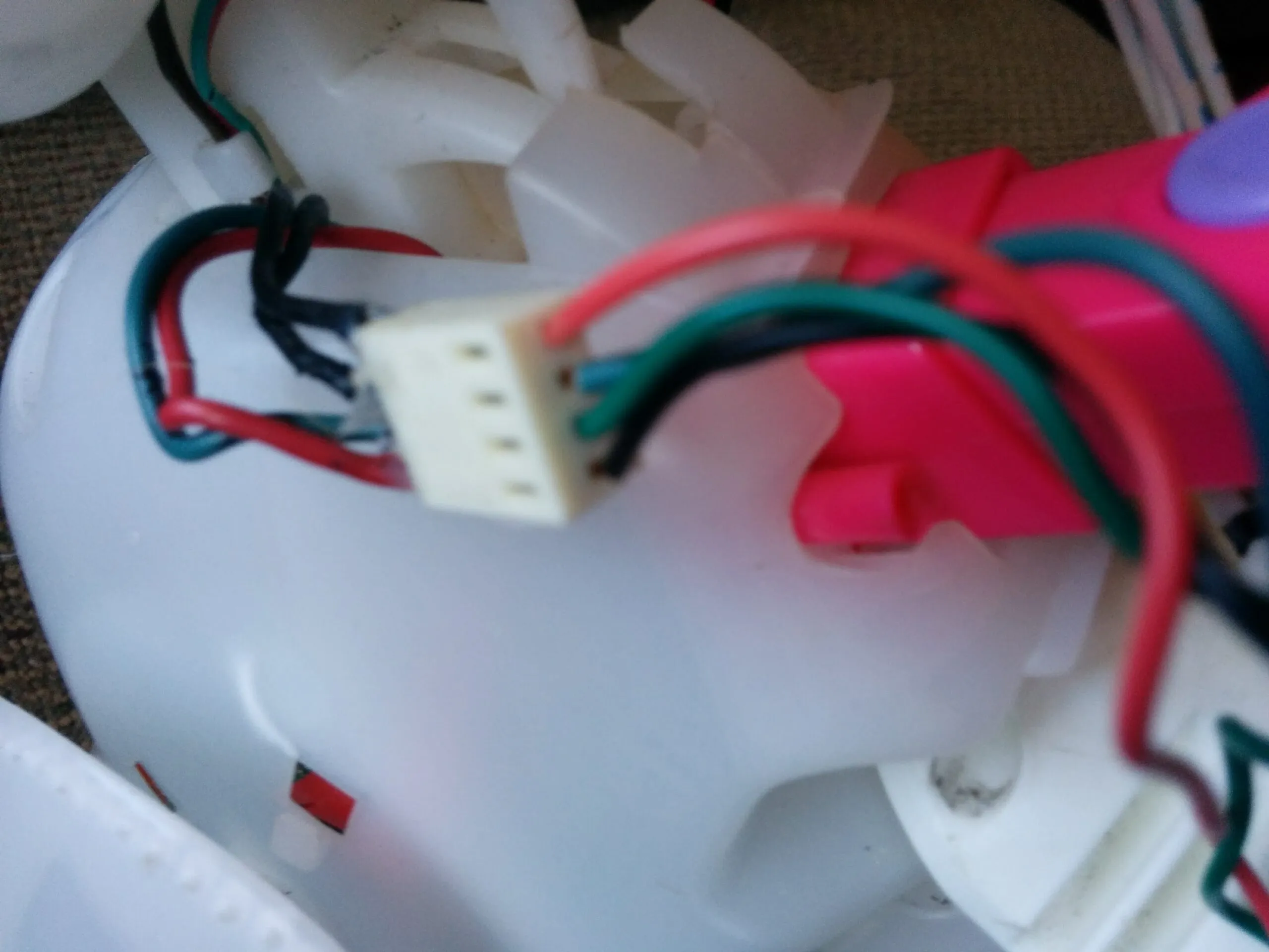 A four-pin connector spliced into Bubbles' wiring harness during the rebuild.
