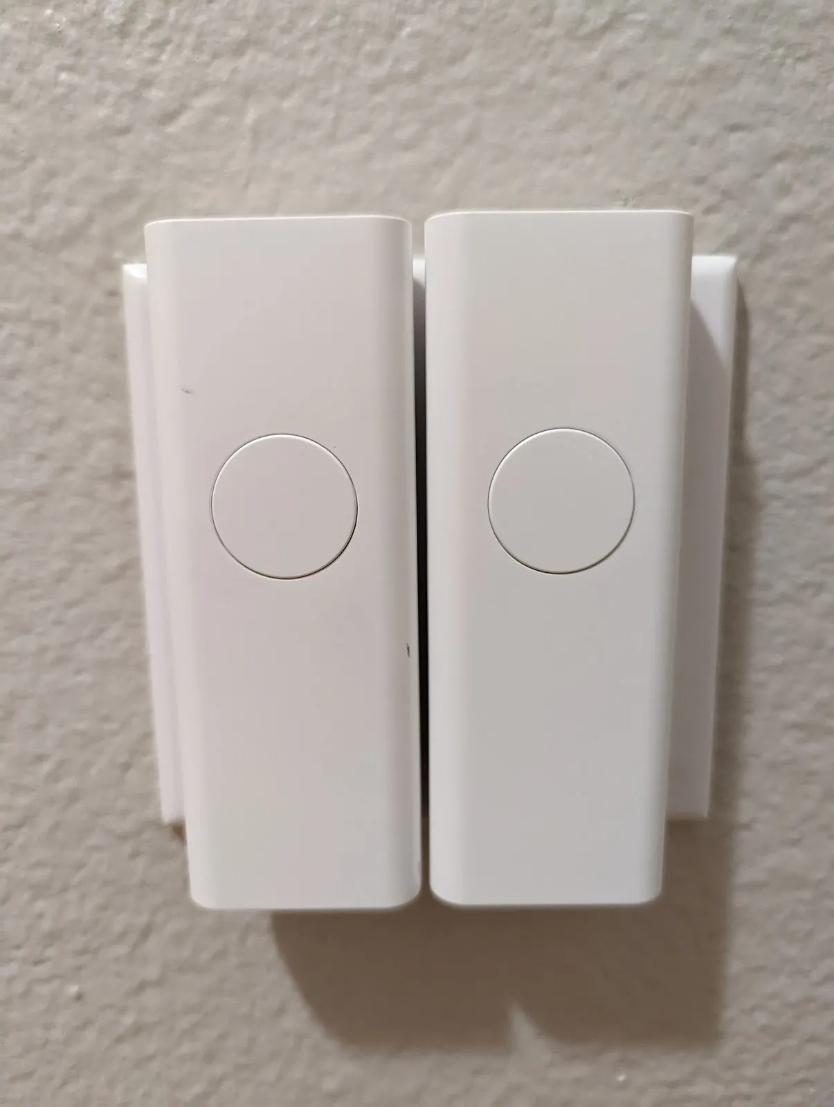 Two Third Reality gen 3 switches side by side, swallowing their rockers entirely.