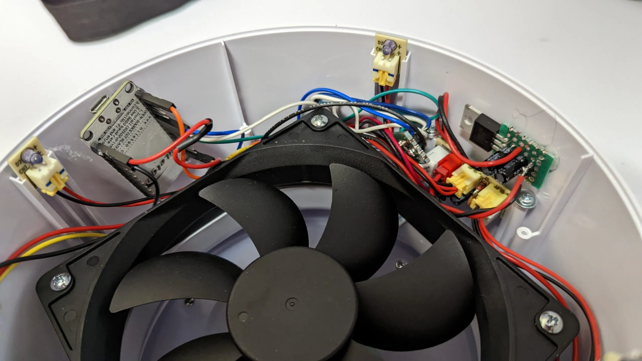 Final wiring around the rim: NodeMCU, regulator, and button boards each in their own bay.