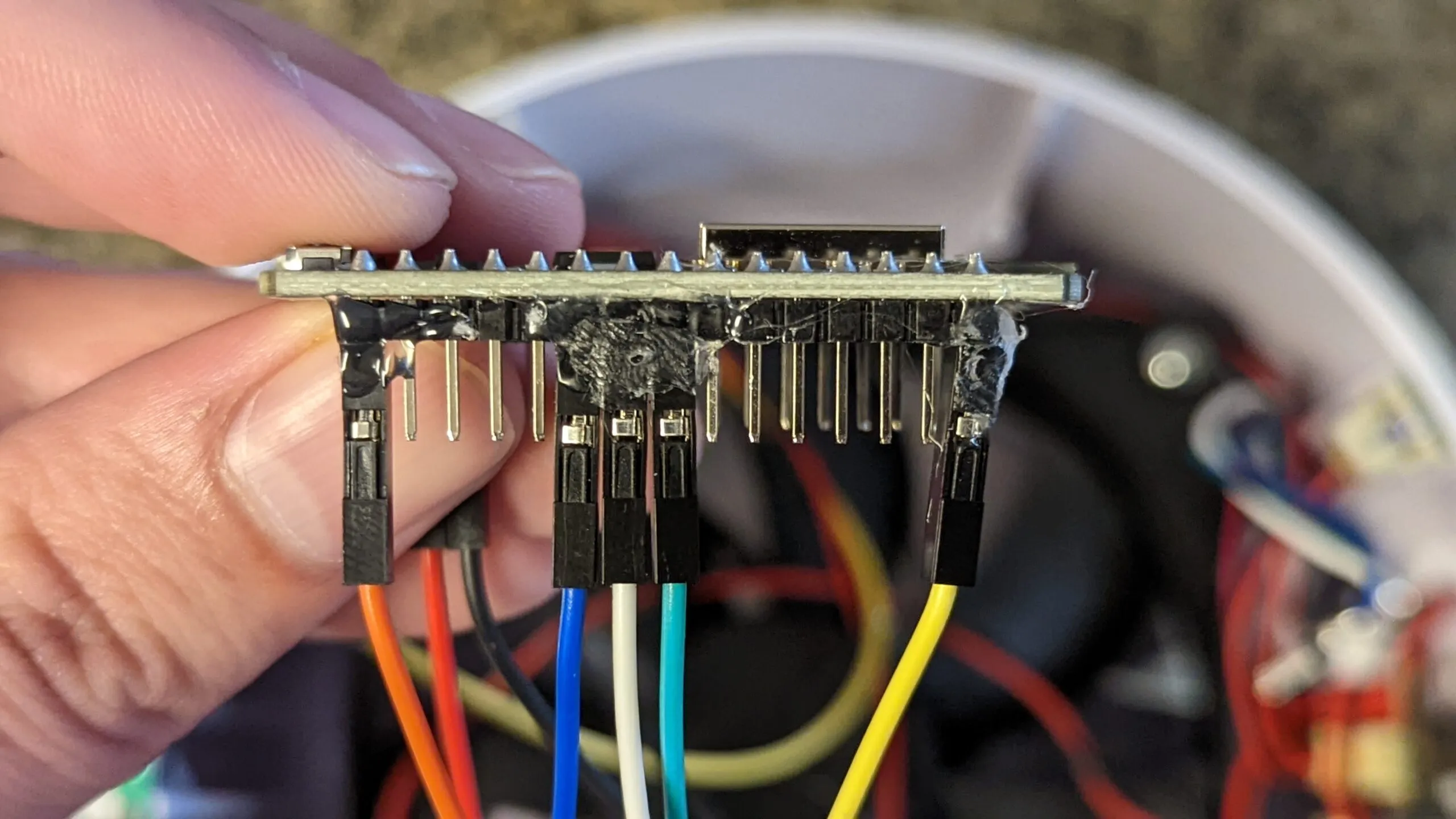 Jumpers hot-glued into the NodeMCU headers so fan vibration cannot shake them loose.
