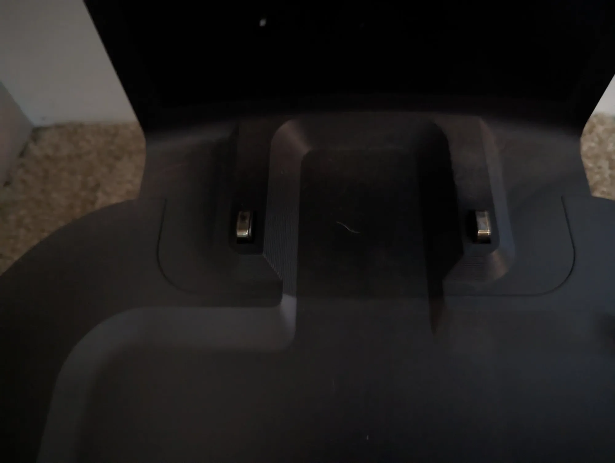 Close view of the charging contacts on the Clean Base.