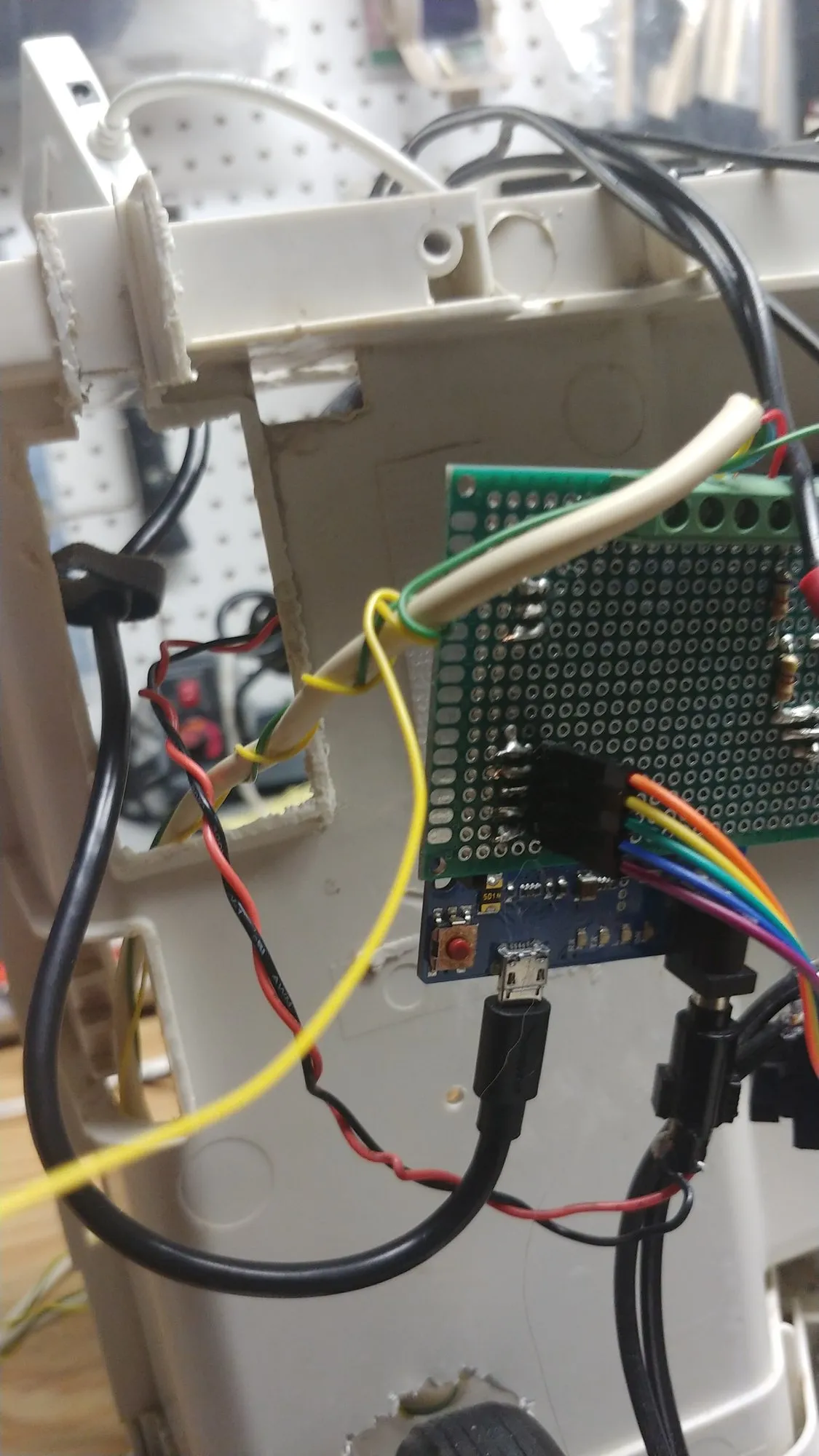 The Leonardo and its interface board from the side, the USB socket facing out and a barrel jack beside it.